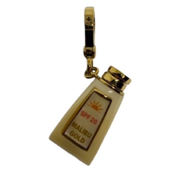 Juicy Couture Malibu Gold Sunscreen Tanning Oil Charm - Picture 1 of 4